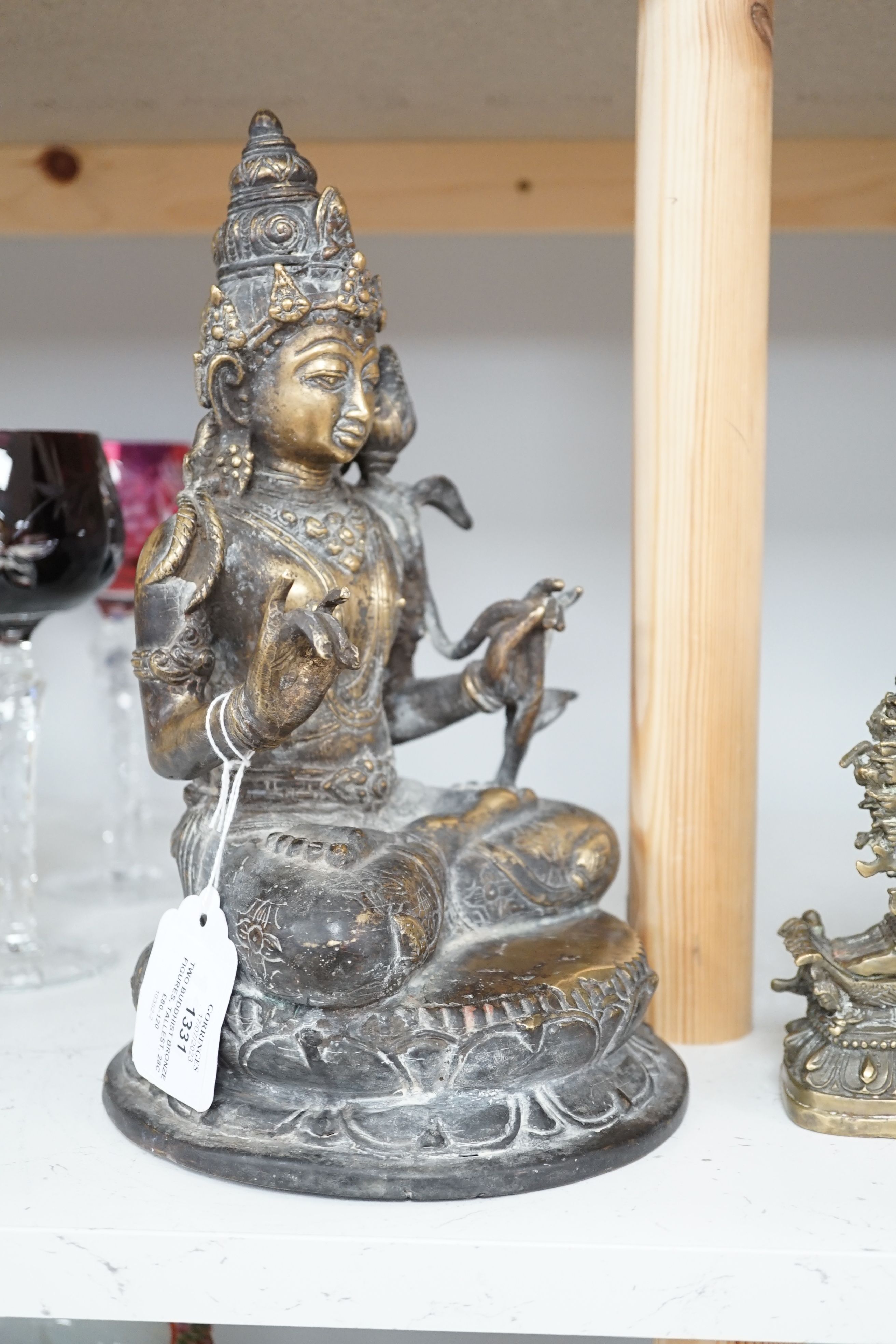 Two Buddhist bronze figures, tallest, 28cm high